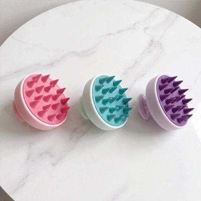 Brosse massage cuir chevelu​ en silicone 3 couleurs