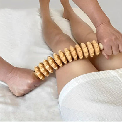 Rouleau de massage ergonomique avec 12 roues sur jambe